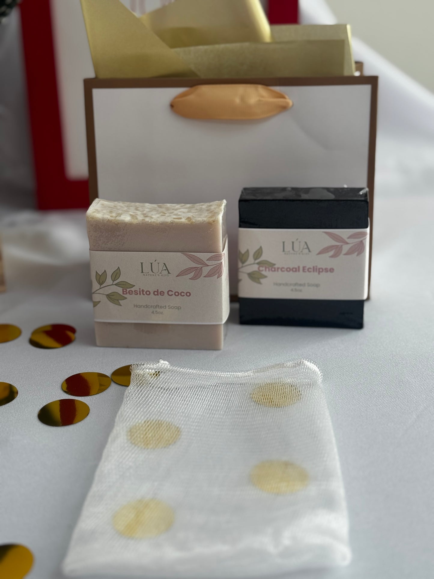 Bundle Jabones Charcoal Eclipse y Besito de Coco + Malla Exfoliadora + Descanso